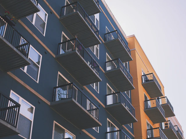 Apartment balconies against the sky